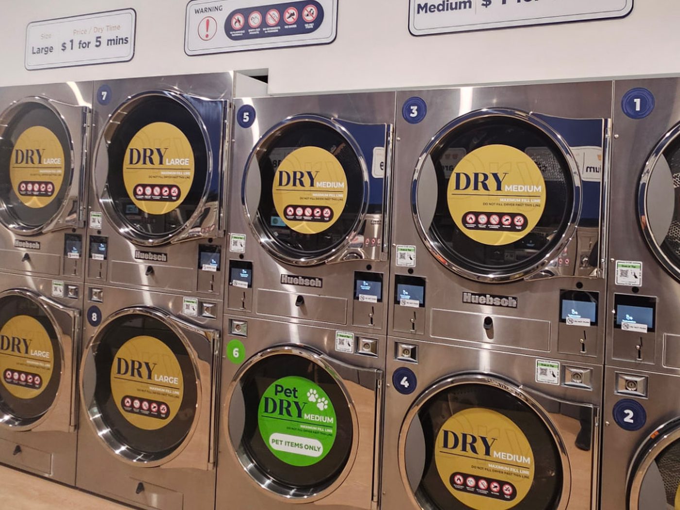The LuxeSpin Dry Zone showing the dedicated Pet Dry machine marked PET ITEMS ONLY